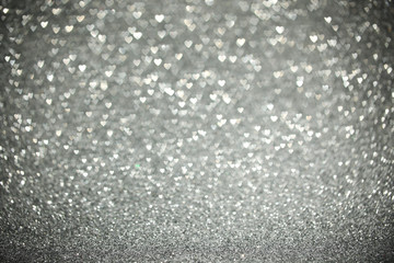Beautiful silver heart bokeh background