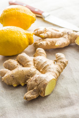 Sliced ginger root and lemon.