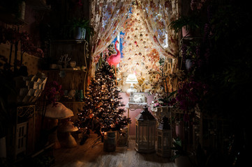 Cute room embellished with Christmas decoration elements and Christmas tree