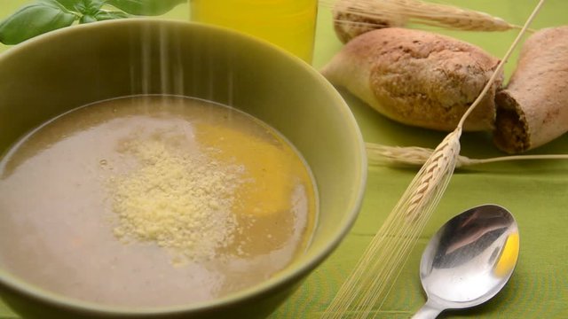 Soup with grana padano cheese