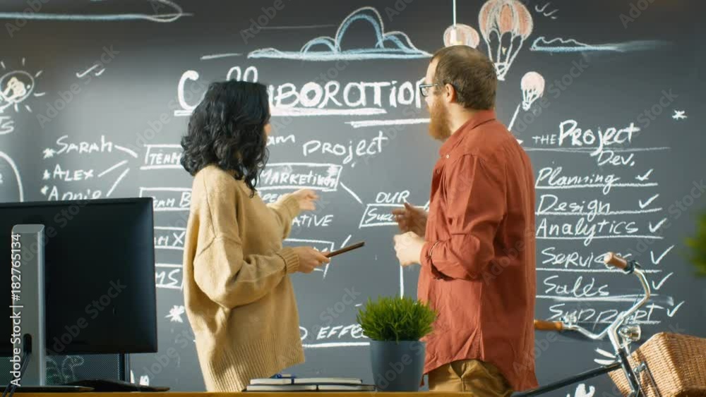 Poster female project manager holds tablet computer talks with male developer, they discuss project plan dr