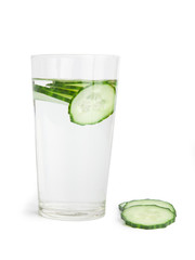 Glass of freshness water with cucumber slices, isolated on a white background