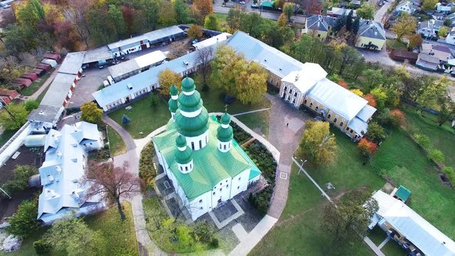 4K .Aerial.  Christian Ortodox church  dome or monastery in city. Circular flight
