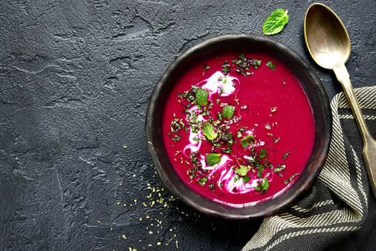 Beetroot creamy soup.Top view with copy space.