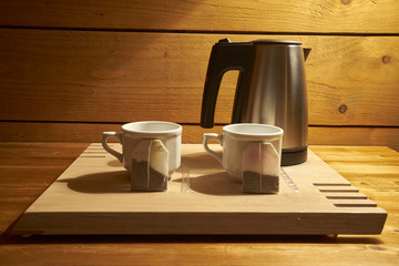 Two  Tea Cups and An Electric Kettle