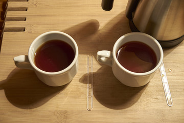 Two  Tea Cups and An Electric Kettle