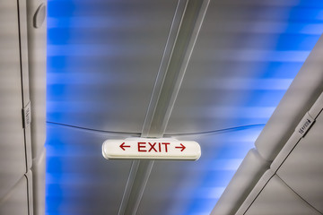 Emergency Exit Sign inside a plane