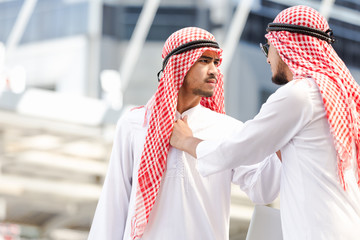 Arab two business man couple quarrels in the city