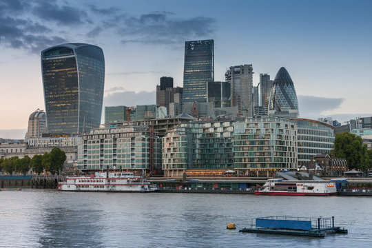 Thames embankment and london skyscrapers in City of London