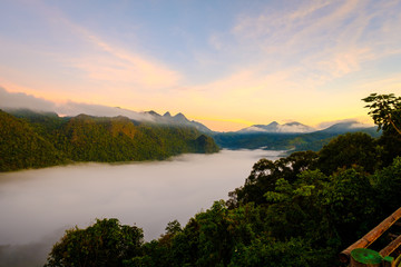 Fototapeta na wymiar high mountains peaks range clouds in fog scenery landscape national park view outdoor at Doi Ang Khang, Chiang Mai Province, Thailand