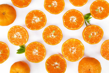 fresh orange with green lea isolate on white background