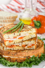 Sandwich with ham, cheese and Bulgarian pepper white bread with flax seeds. Breakfast. Selective focus