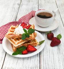 belgian waffles with strawberries and mint
