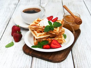 belgian waffles with strawberries and mint