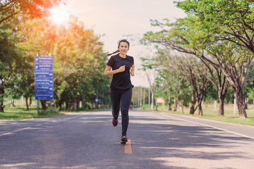 Young woman jogging in nature