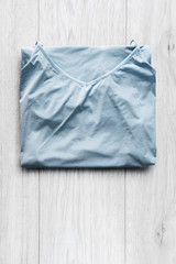 Fototapeta premium Blouse on wooden background