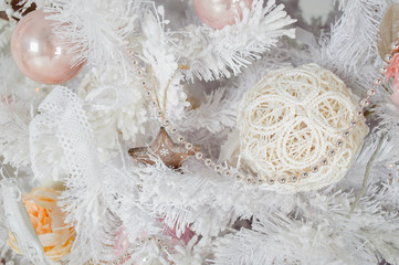  beautiful white Christmas tree with toys closeup