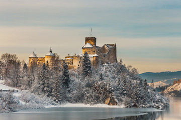 Beautiful view of Niedzica Castle during a frosty evening, Poland