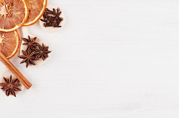 Christmas spices for mulled wine on wood white board, top view, copy space.