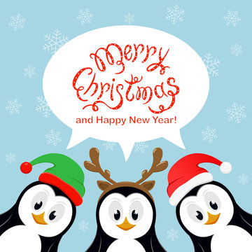 Merry Christmas in speech bubble with snowflakes and three penguins on blue background