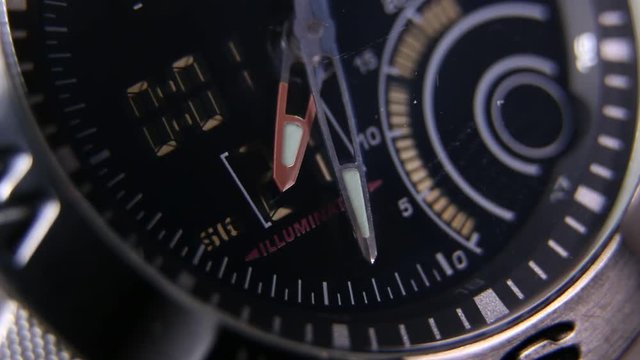 Macro close up of a tactical digital watch face functioning
