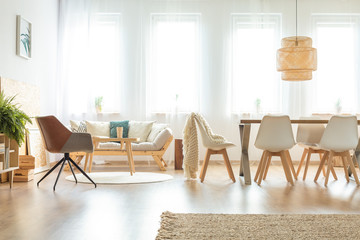 Multifunctional dining room with white lamp