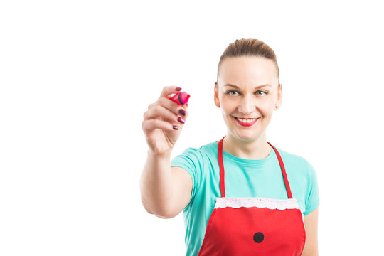 Woman wearing red apron writing on invisible screen - Powered by Adobe