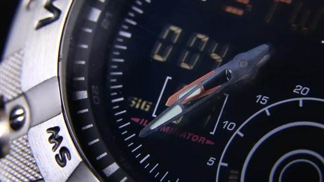 Macro close up of a tactical digital watch face functioning
