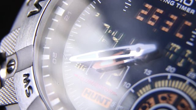 Macro close up of a tactical digital watch face functioning
