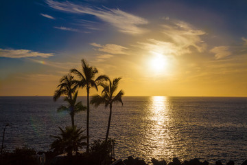 Fototapeta na wymiar Amazing background on Adeje coast at sunset in summer holiday, in Tenerife, Canary island