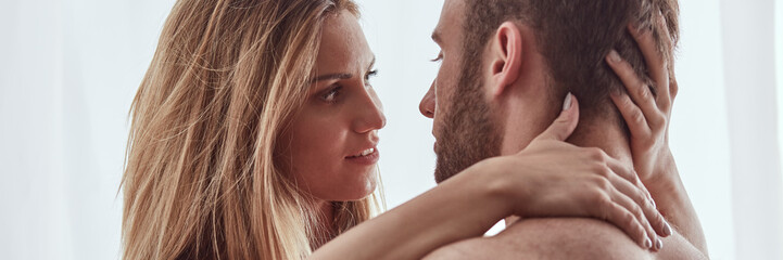 Woman looking into man's eyes