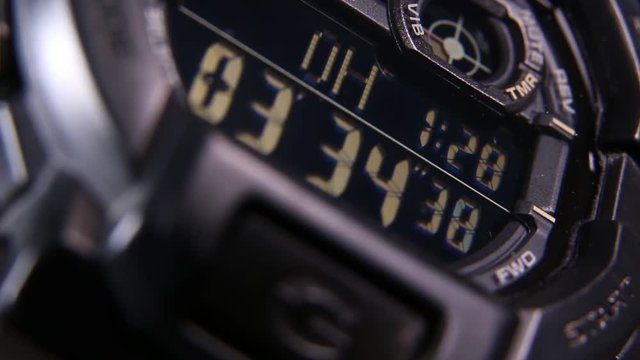Macro close up of a tactical digital watch face functioning
