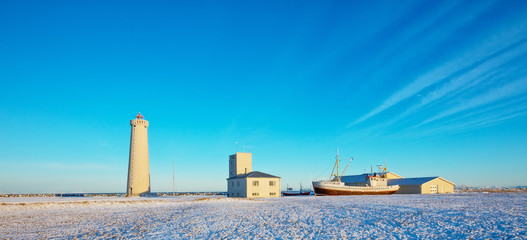 Beautiful Gardur lighthouse in Iceland. Winter landscape