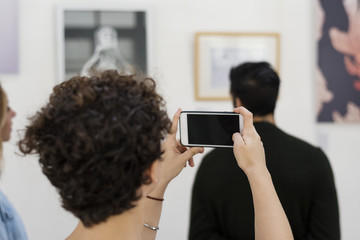 people checking out the exhibition