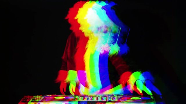 father christmas dancing at a disco party. this version has intentional overlayed video distortion and glitch effects.