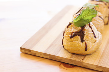 delicious homemade arabic eclairs on wood cutting board