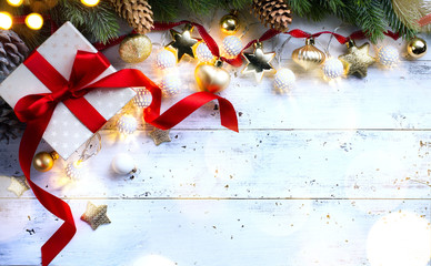 Christmas holidays composition on wooden background; Christmas tree decoration and copy space for...