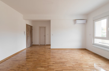 Fototapeta na wymiar Beautiful apartment interior, large room with window
