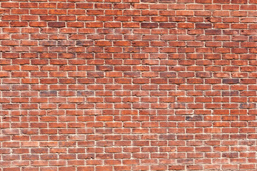 Wall from a red brick - Powered by Adobe