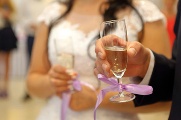 Champagne for bride and groom at wedding reception