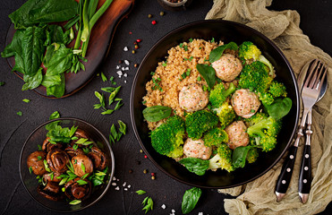 Baked meatballs of chicken fillet with garnish with quinoa and boiled broccoli. Proper nutrition. Sports nutrition. Dietary menu