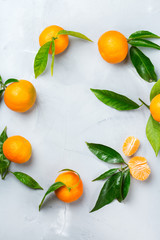Organic healthy tangerine mandarine wreath on a table