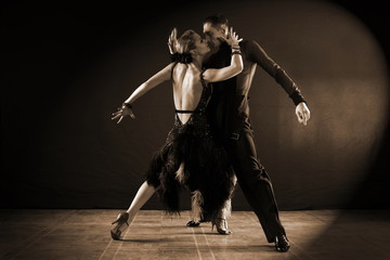 Fototapeta na wymiar dancers in ballroom isolated on black background