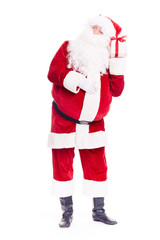Isolated portrait of Santa Claus holding Christmas gift box