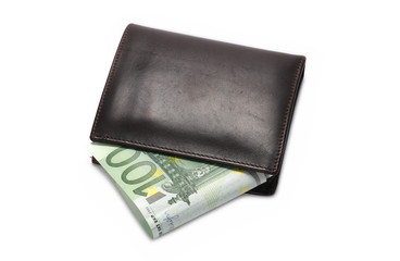 Hundred euro bills in brown wallet, isolated on white background
