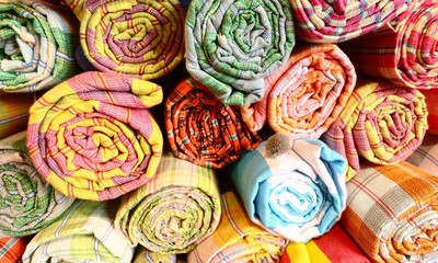 Fototapeta na wymiar Colorful material fabric rolls