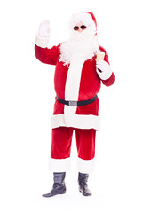 Portrait of cool Santa Claus in traditional costume wearing sunglasses on white background