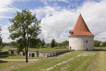Fototapeta premium Kuressaare Castle and its tower. Summer sunny day. Saaremaa island, Estonia