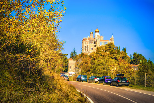 autumn castle roadside Rocchetta Mattei castle in Riola, Grizzana Morandi - Bologna province Emilia Romagna, Italy