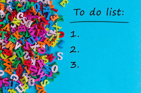 To do list conceptual. Mockup with empty space and many little alphabet letters at blue background